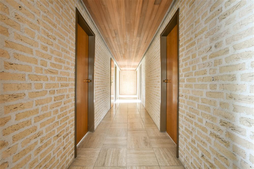 Narrow Corridor with wooden doors photo